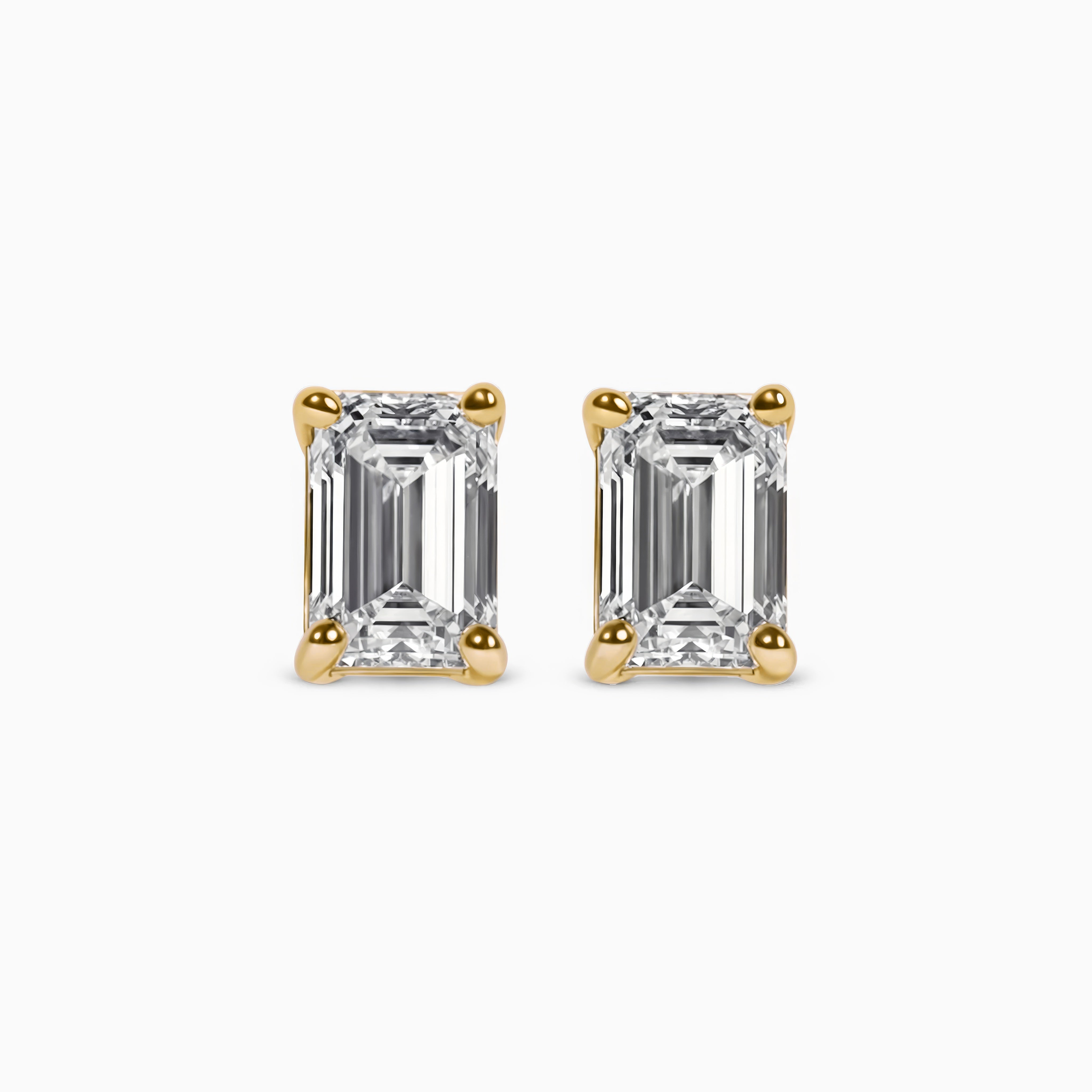 Boucles d’oreilles Île Saint-Louis, diamant taille émeraude, or jaune 18 carats – Ora Paris
